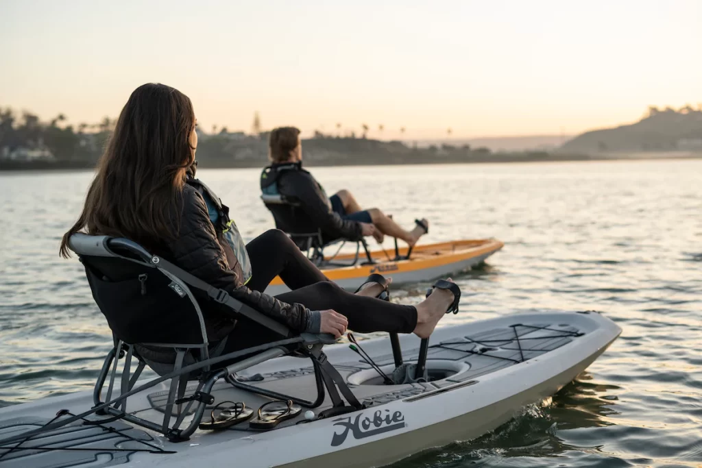 Two people peddling the Hobie Mirage Lynx